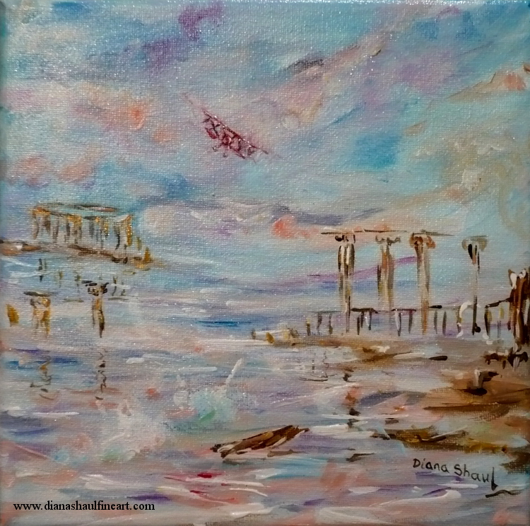 Painting of a biplane coming in for landing on an abandoned beach.