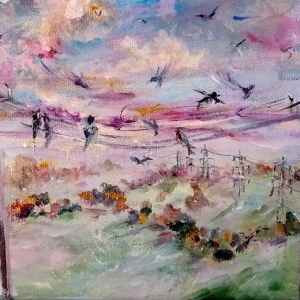 An autumn landscape featuring a streaky sunset and birds taking their places on telephone wires.